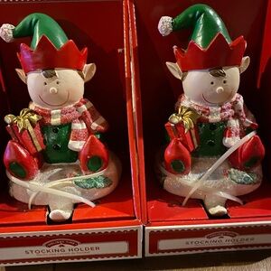 2 NEW resin elf stocking holders … each 5 1/2 inches tall by 3 1/4 inches wide